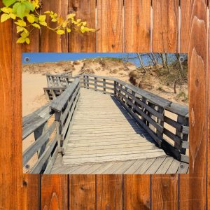 Tuinposter met een kronkelend paadje door de duinen naar zee